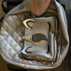 Silver Quilted Backpack with Unicorn Design